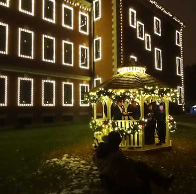 Carolers in the Garden